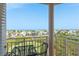 Balcony features seating area with scenic neighborhood views, perfect for outdoor relaxation and enjoyment at 4516 Seagull Dr # 601, New Port Richey, FL 34652