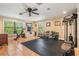 Home gym featuring exercise equipment and a ceiling fan at 475 Holly Hill Rd, Oldsmar, FL 34677