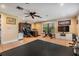 Home gym with exercise equipment, a desk, and a TV at 475 Holly Hill Rd, Oldsmar, FL 34677