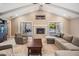 Living room with fireplace and sliding door access to outdoor patio at 475 Holly Hill Rd, Oldsmar, FL 34677