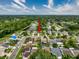 Panoramic aerial shot of the home and neighborhood, highlighting the community layout and green spaces at 5016 Cypress Trace Dr, Tampa, FL 33624