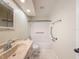 Bathroom features a bathtub-shower combo at 5016 Cypress Trace Dr, Tampa, FL 33624