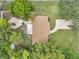 A bird's eye view of the home, highlighting the well-maintained landscaping and outdoor features at 5053 18Th St, Zephyrhills, FL 33542