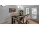 Dining room table set with views to the outdoors at 5053 18Th St, Zephyrhills, FL 33542