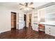 Bedroom with custom built-ins, a stylish vanity, and a walk-in closet with wood accents at 5106 Five Acre Rd, Plant City, FL 33565