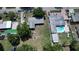 Birds-eye view showing lot and neighboring houses, including one with pool at 5719 13Th E St, Bradenton, FL 34203