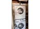 Modern, stacked Samsung washer and dryer, optimizing space and adding convenience at 5719 13Th E St, Bradenton, FL 34203