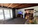 Relaxing living room features, a large television, comfortable couch and ample sunlight at 5719 13Th E St, Bradenton, FL 34203