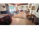 Spacious living room with fireplace, built-in shelves, and a cozy seating area at 5719 13Th E St, Bradenton, FL 34203