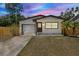 Beautiful home with fresh exterior paint, and an attached one car garage at 6220 Pershing Ne St, St Petersburg, FL 33702