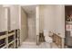 Bathroom with shower, toilet, and tile flooring, offering a blank canvas for renovation at 647 74Th N Ave, St Petersburg, FL 33702
