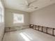Bright bedroom with a ceiling fan and large window, ready for personalization at 647 74Th N Ave, St Petersburg, FL 33702