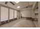 Open-concept living room featuring tile floors and natural light at 647 74Th N Ave, St Petersburg, FL 33702