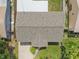 Birds eye view of the home and yard, demonstrating roof features and property lines at 6941 58Th N Way, Pinellas Park, FL 33781