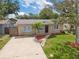 Charming single-story home with a well-maintained lawn and inviting curb appeal at 6941 58Th N Way, Pinellas Park, FL 33781