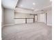 Large, carpeted bonus room area with recessed lighting at 7276 Notched Pine Bnd, Wesley Chapel, FL 33545