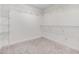 Spacious walk-in closet with ample wire shelving for organized storage at 7276 Notched Pine Bnd, Wesley Chapel, FL 33545