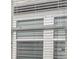 Image of windows with blinds at 7276 Notched Pine Bnd, Wesley Chapel, FL 33545
