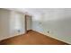 A bedroom featuring a window, closet, and off-white walls at 7309 Monterey Blvd, Tampa, FL 33625