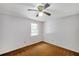 Bedroom with fan and window allowing natural light into the space at 7309 Monterey Blvd, Tampa, FL 33625