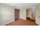 Bedroom with closet featuring carpeted floors and light neutral walls at 7309 Monterey Blvd, Tampa, FL 33625