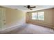 Spacious bedroom with ceiling fan, natural light and closet at 7309 Monterey Blvd, Tampa, FL 33625