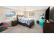 Bedroom with a large bed, bedside table, and a window, offering a relaxing atmosphere at 8524 Winter Haven Dr, Hudson, FL 34667