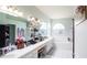 Bright bathroom with double sinks, soaking tub, and lots of counter space at 8679 Burning Tree Cir, Seminole, FL 33777