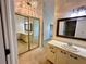 Bathroom with mirror and cabinets, featuring neutral colors at 907 San Carlos Ne Ave, St Petersburg, FL 33702