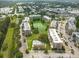 Beautiful condo community featuring a serene pond, pool, mature landscaping, and convenient parking at 960 Starkey Rd # 2103, Largo, FL 33771