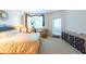 Bedroom showcasing a bed, furniture, and window providing lots of natural light at 960 Starkey Rd # 2103, Largo, FL 33771