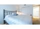 Bright bedroom featuring a bed, and a closet providing ample storage space at 960 Starkey Rd # 2103, Largo, FL 33771