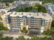 Scenic view of the apartment building with balconies overlooking the lake at 960 Starkey Rd # 2103, Largo, FL 33771