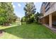 Scenic view of lush landscaping and a serene lake creating a tranquil setting around the condo building at 960 Starkey Rd # 2103, Largo, FL 33771