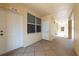 Hallway of the building showing a window and multiple doors at 960 Starkey Rd # 2103, Largo, FL 33771