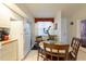 Clean kitchen with a dining space, features an exercise machine at 960 Starkey Rd # 2103, Largo, FL 33771
