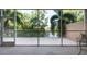 Spacious screened patio with views of lush greenery and waterfront views at 960 Starkey Rd # 2103, Largo, FL 33771