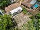 Aerial view of property with backyard, showcasing its potential for landscaping or outdoor activities at 9927 Woodridge Ct, Port Richey, FL 34668