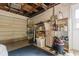 Spacious garage offers ample storage and workspace with washer and dryer at 9927 Woodridge Ct, Port Richey, FL 34668