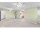 Large primary bedroom with a ceiling fan and a ensuite bathroom at 996 56Th S Ave, St Petersburg, FL 33705