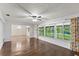 Bright sun room with lots of windows and backyard views at 996 56Th S Ave, St Petersburg, FL 33705