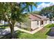 Charming single-Gathering home with a well-manicured lawn and mature trees at 10401 Lakeside Vista Dr, Riverview, FL 33569