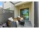 Cozy balcony with comfortable seating, perfect for relaxation and enjoying outdoor views with a cup of coffee at 11526 Crowned Sparrow Ln, Tampa, FL 33626
