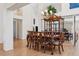 Elegant dining room with hardwood floors, chandelier, and decorative accents at 11638 Branch Mooring Dr, Tampa, FL 33635