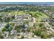 Aerial view of residential neighborhood with golf course, lakes, and community amenities at 12920 124Th Ave, Largo, FL 33774