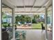 View of a fully fenced and landscaped backyard with an outdoor firepit at 12920 124Th Ave, Largo, FL 33774