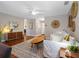 Inviting living room with modern furnishings, wood floors, and ample natural light at 12920 124Th Ave, Largo, FL 33774