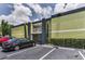 Apartment building exterior with a gated entrance at 1301 S Howard Ave # A22, Tampa, FL 33606