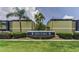View of 1301 SoHo Condominiums signage with lush landscaping and greenery at 1301 S Howard Ave # A22, Tampa, FL 33606