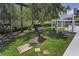 A community grill area with landscaping near the pool at 1301 S Howard Ave # A22, Tampa, FL 33606